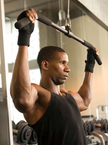 Man at fitness center-Legacy Apartments, Pittsburgh, PA 15219